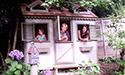 Michael and the new owners of this playhouse